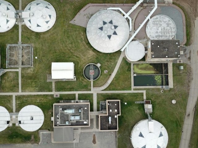Aerial view of a water treatment facility, Ontario employee wins termination pay dispute in the Clean Water Works case.