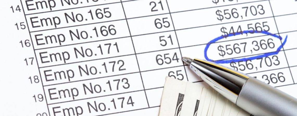 Close up of a payroll spreadsheet with employee numbers and amounts, statutory pay in BC explained for workers and employers.