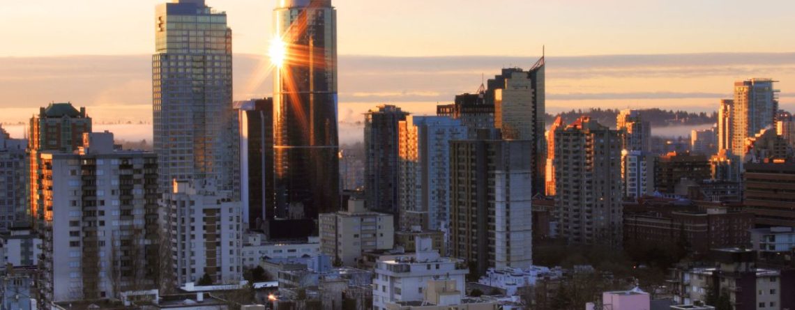 Vancouver skyline at sunrise representing ESB investigations and penalties in BC for employment standards violations.