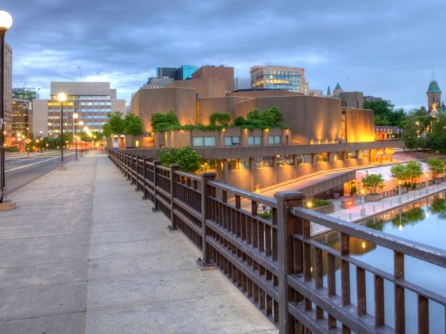 Ottawa cityscape near federal buildings where Federal Court upholds harassment investigation findings against Chief Administrator.