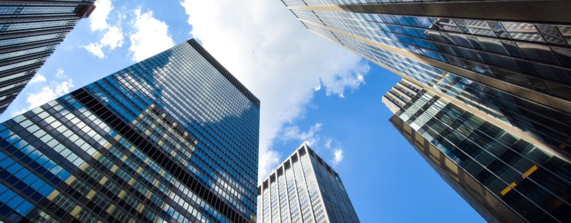 Toronto corporate skyscrapers from below as Ontario Court invalidates CIBC termination clause in landmark employment ruling.