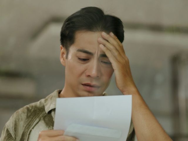Worried man reading a letter, what Ontario employees should know before responding to their employer about workplace issues.