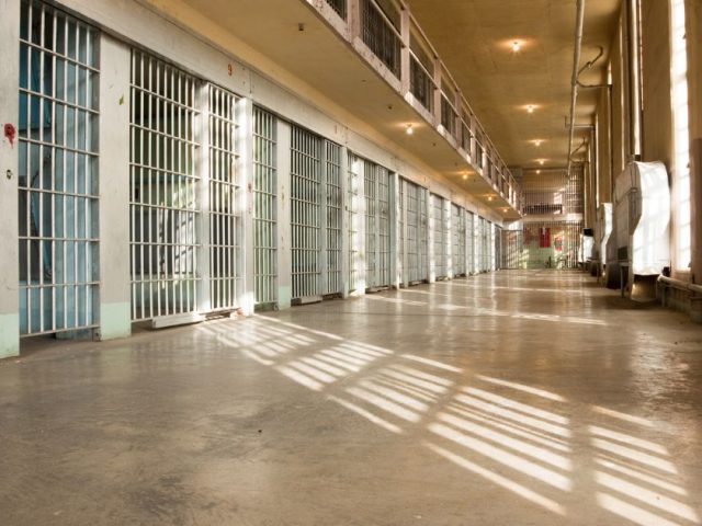 Range of jail cells in a correctional facility, illustrating the Shin v. British Columbia probationary dismissal case